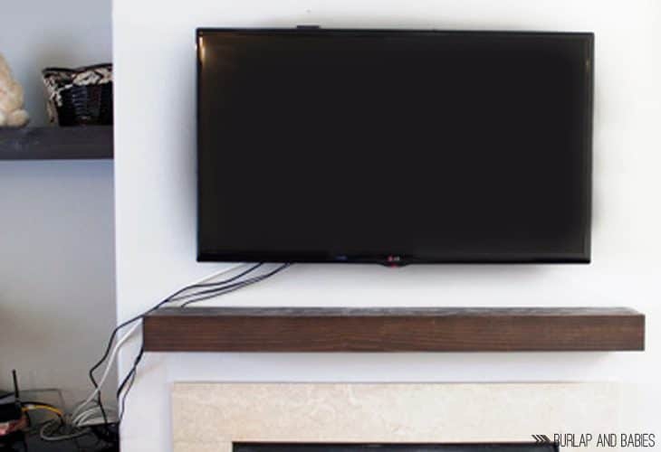 TV mounted on wall image.