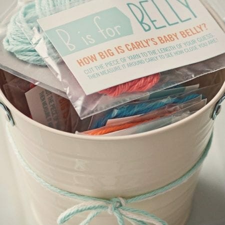 Pail with baby shower game inside image.
