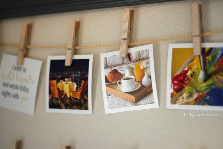 Photos on string with clothespins image.