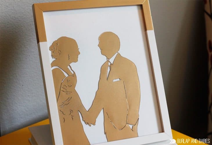 Create this DIY Wedding Picture Silhouette for a traditional first anniversary gift using paper! | Anyone can make a stunning silhouette using one of your favorite wedding photos and an exacto knife. Find out how to make it here + 10 additional paper gift ideas! 