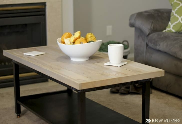 World Market Coffee Table Makeover | A nice blend where farmhouse meets industrial. Use an old pallet, some paint, and stain to create a custom gorgeous coffee table to fit your style! Get the World Market look without the World Market price!