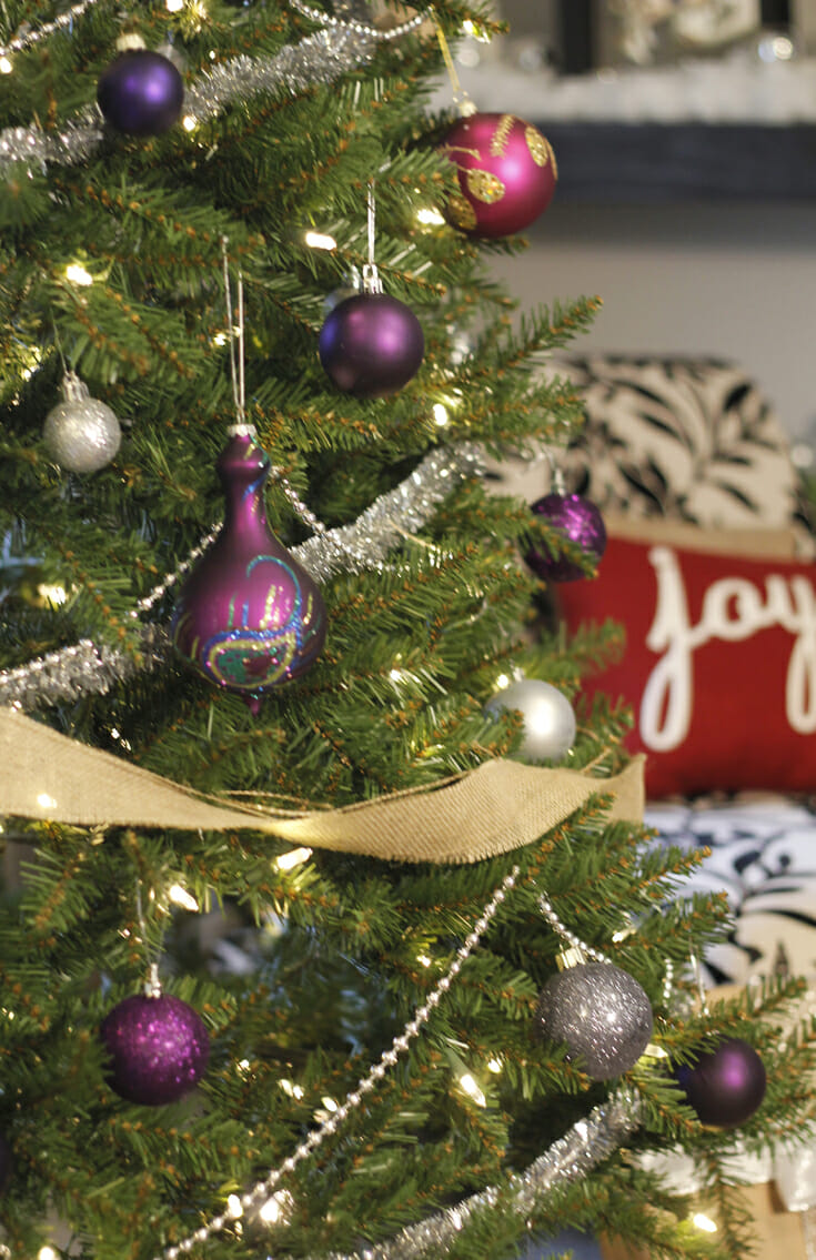 Silver and purple christmas tree ornaments image.