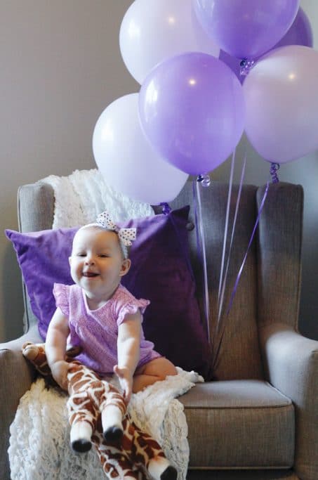 Baby photo with balloons image.