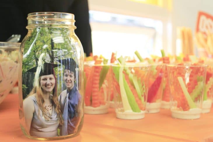 Check this out for many creative college graduation party ideas full of DIY projects and graduation party dessert ideas. Veggie sticks in cups are an easy finger food when there's standing room only.