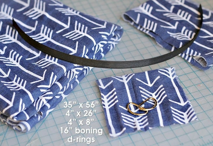 Blue fabric with white accents, d-rings and boning image.