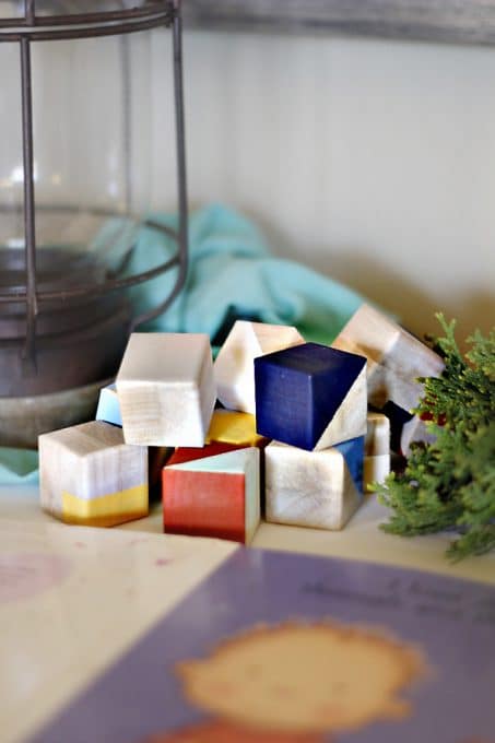 Make these easy DIY geometric wood blocks perfect as nursery decor or for baby shower decor. 