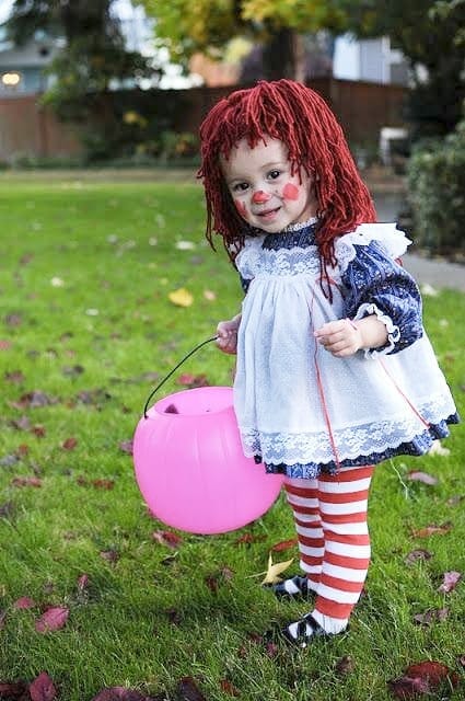 Little girl in DIY Raggedy Ann costume image.