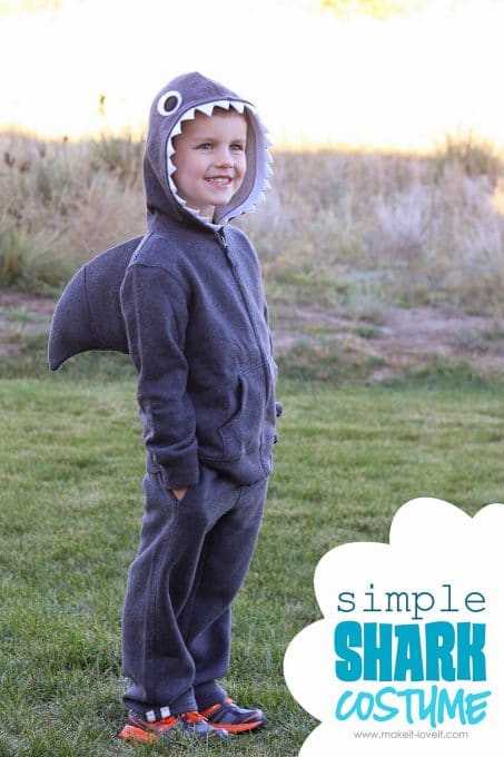 Little boy in DIY shark costume image.