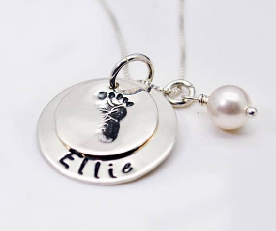 Hand-stamped silver necklace image.