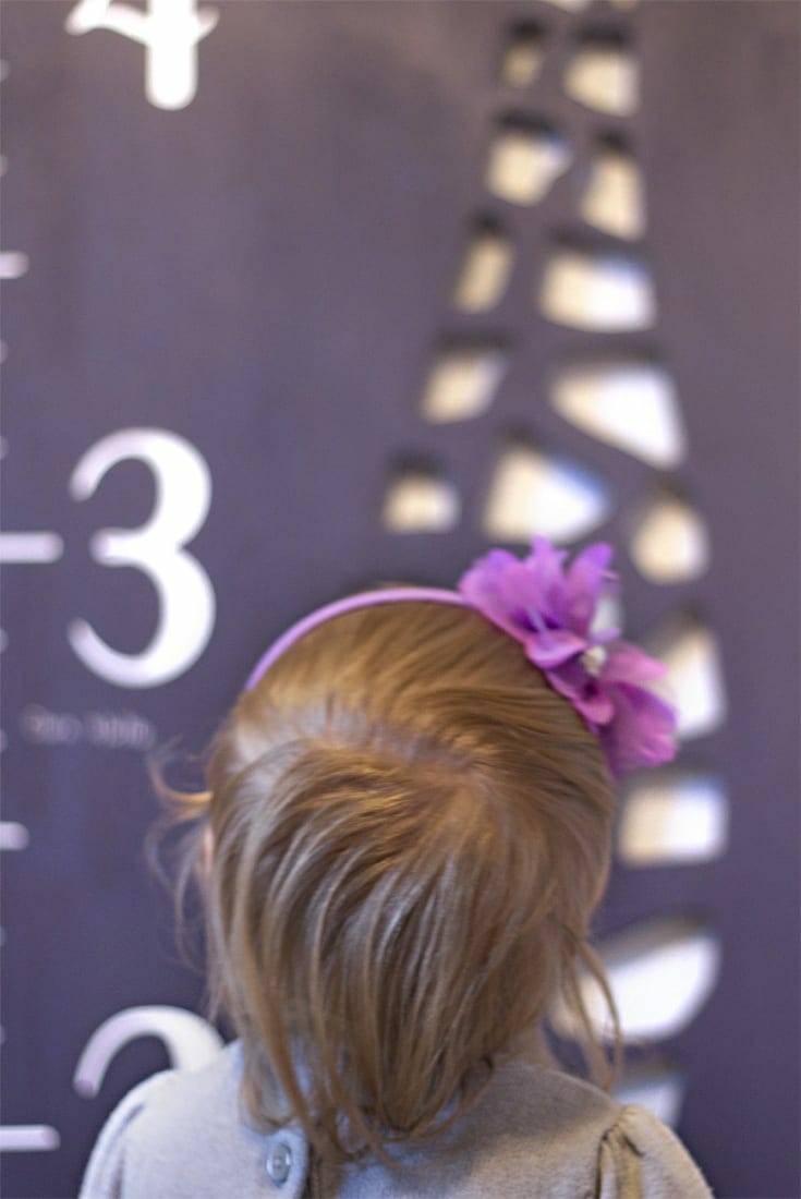 Little girl in purple headband image.