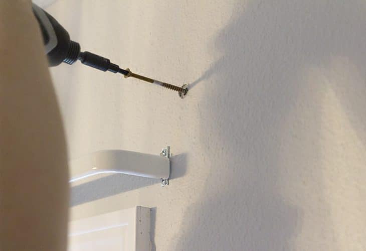 Drilling into wall image.