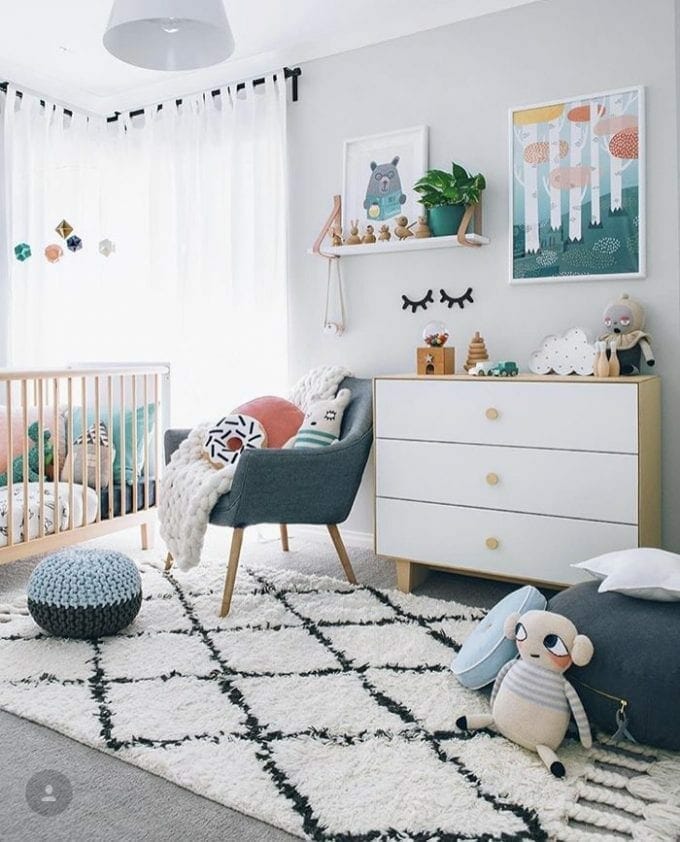 Neutral baby nursery room image.