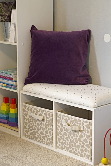 Child's organized space with purple pillow image.