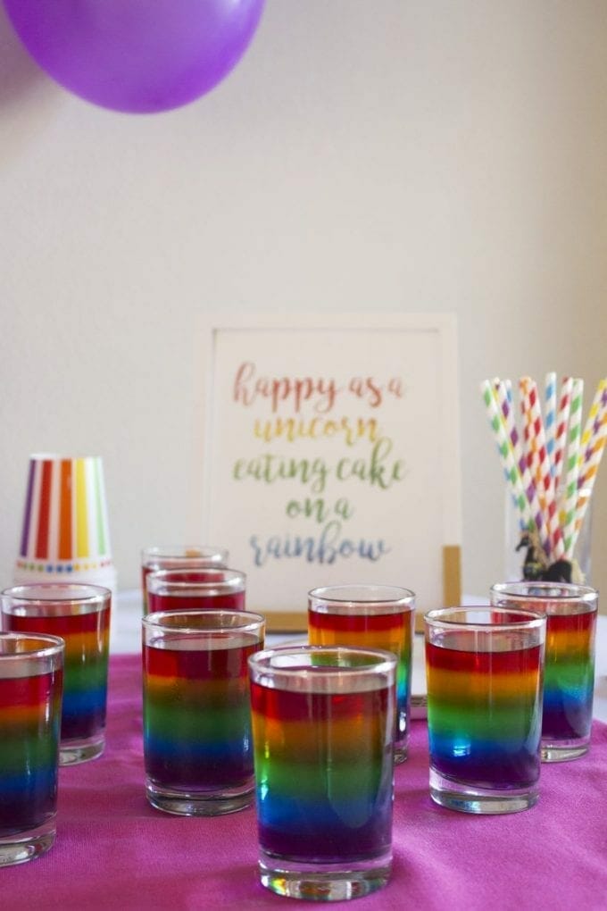 Rainbow themed birthday party jelly shots image.