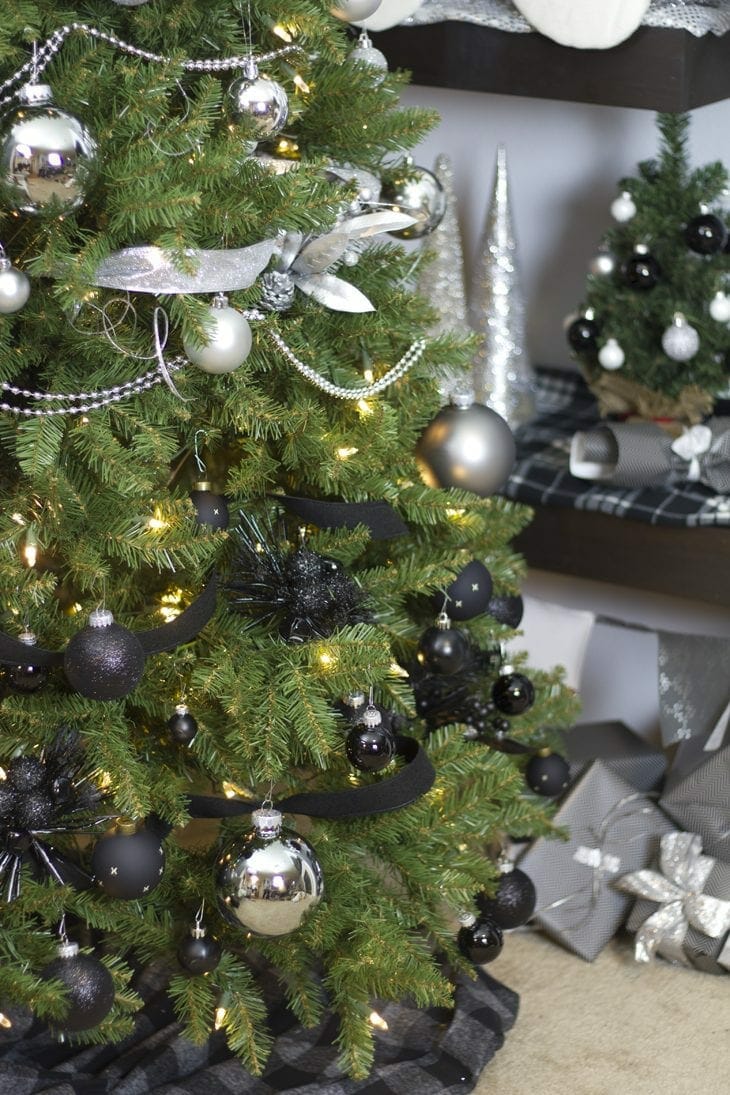 Show off your holiday decor with a gorgeous modern white, silver, and black ombre Christmas tree this year. So many fun Christmas home decor ideas.