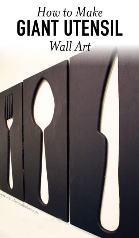 Giant utensil wall art fork, spoon and knife image.