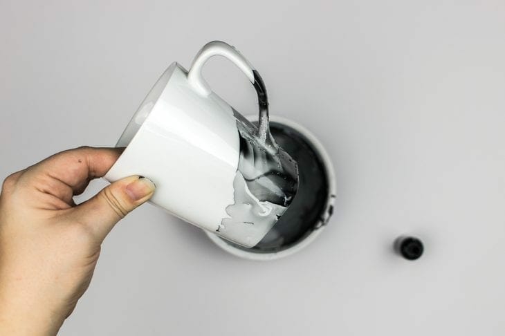 Image of dipping mug in nail polish