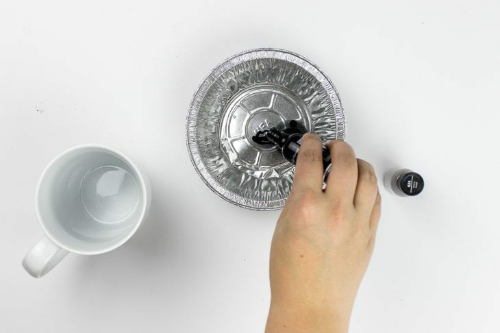 Image of pouring nail polish for marble mugs