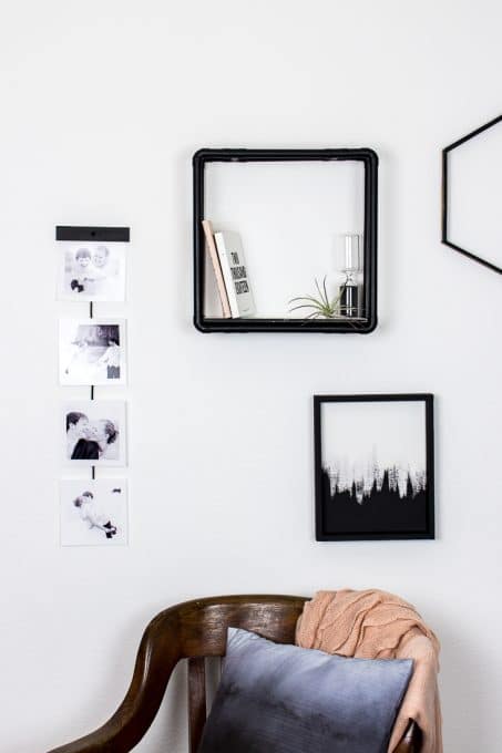 Create this simple pictures wall hanging using just a few items to show off some of your favorite photos. #diy #homedecor