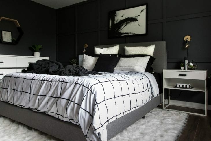 Modern bed with black and white duvet cover