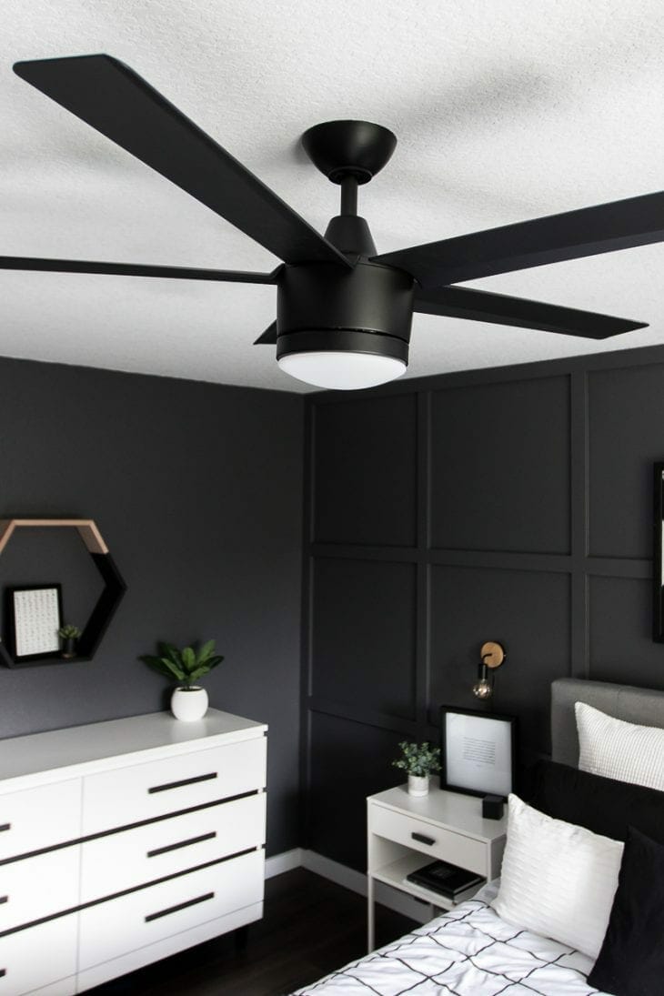 Matte black fan in modern bedroom