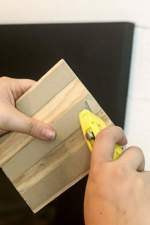 Image of cutting the back of Stikwood