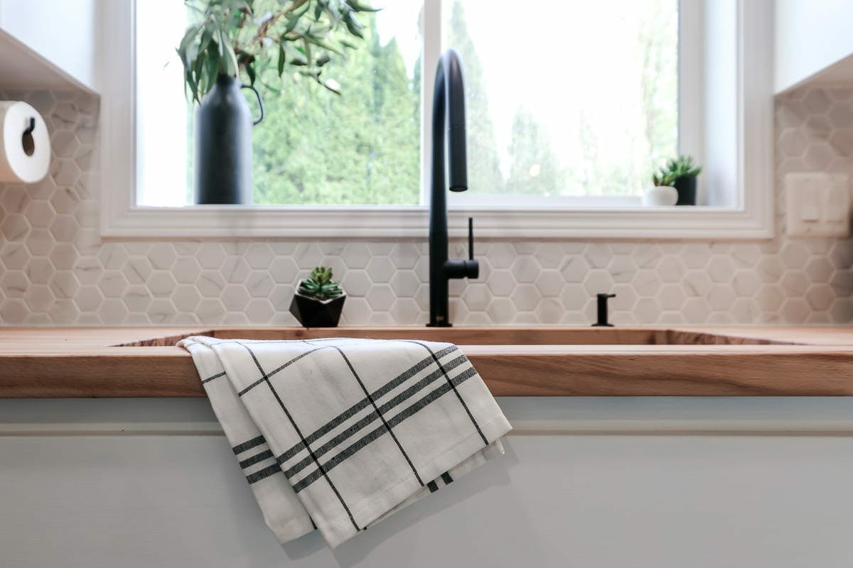 Image of striped towel on kitchen sink