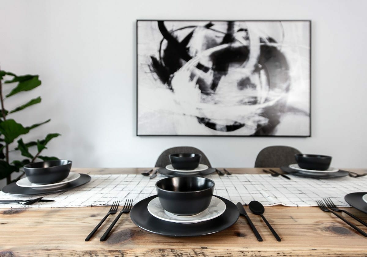 Image of modern dining table with dish set