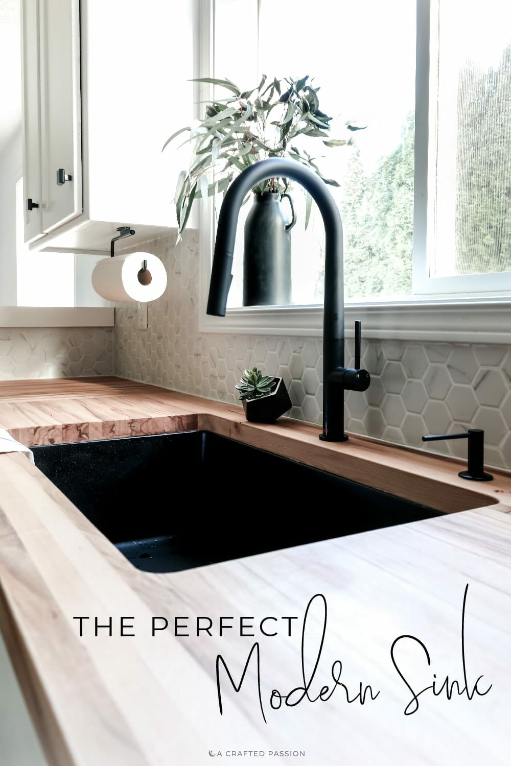 Looking for a new sink? With clean lines, a black finish, and easy to clean surface, this is the perfect modern kitchen sink! Sponsored by Elkay #modernkitchen #kitchensink