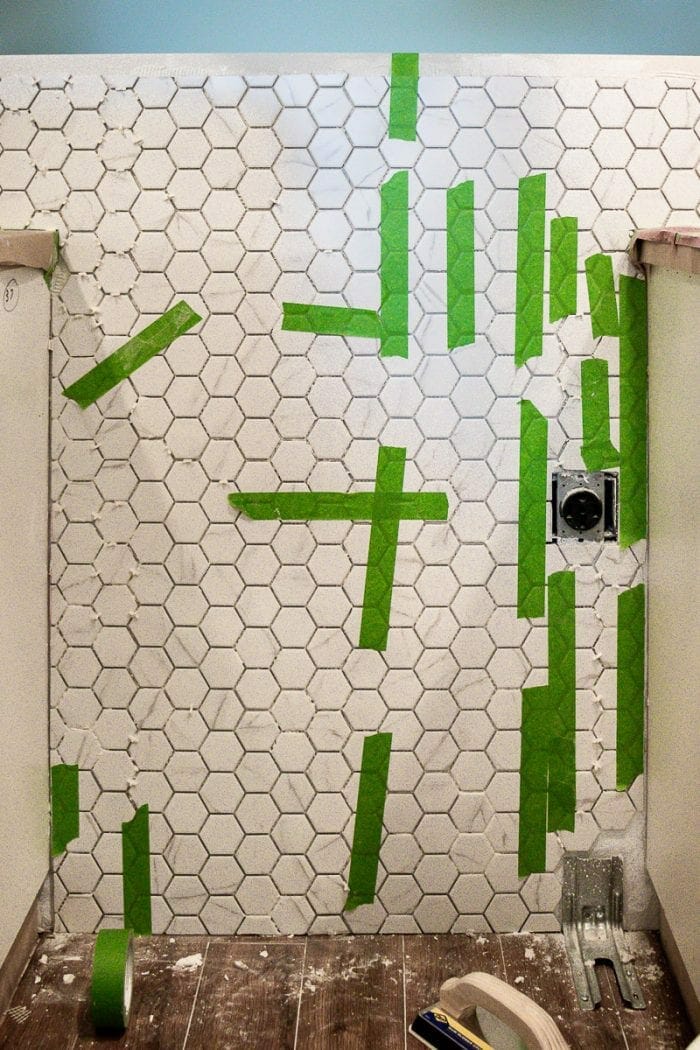 Image of FrogTape holding up the tiles