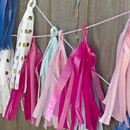 Learn how to make simple tissue paper tassels that are a perfect addition to any party decorations!
