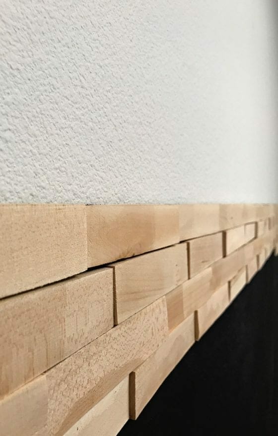 How to Create a Dramatic Wood Shims Wall in Your Home