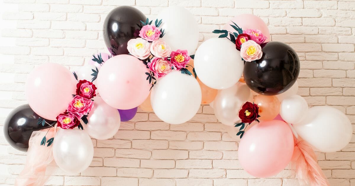 how to hang balloon arch on wall
