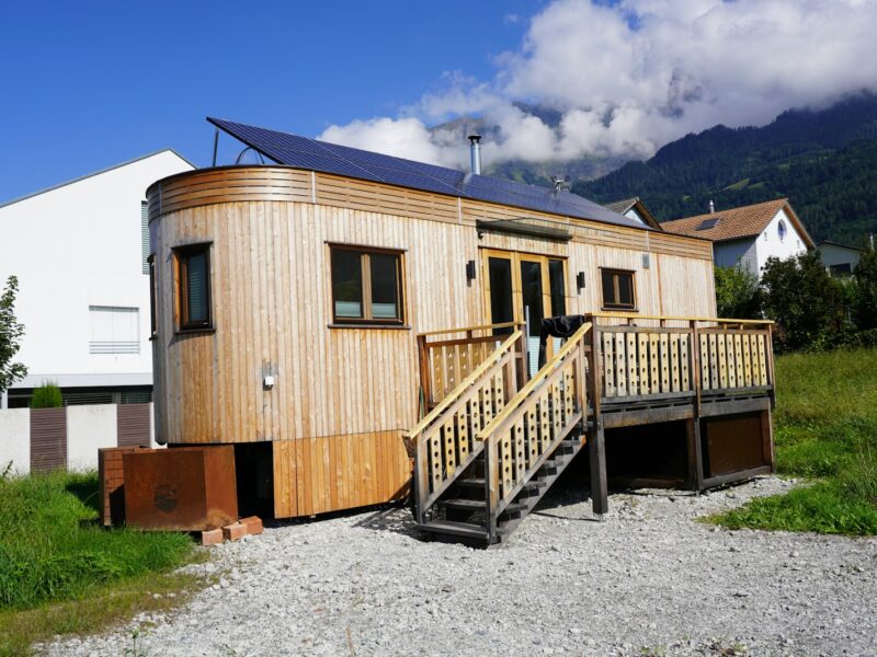 a house with a solar panel on the roof