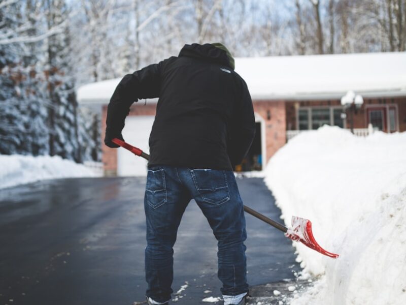 person shoveling snow