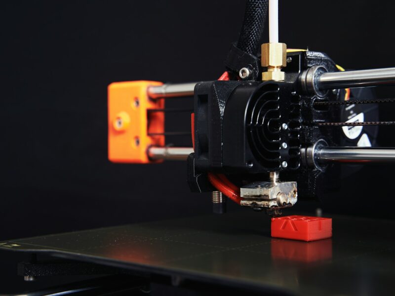 a close up of a machine with a black background