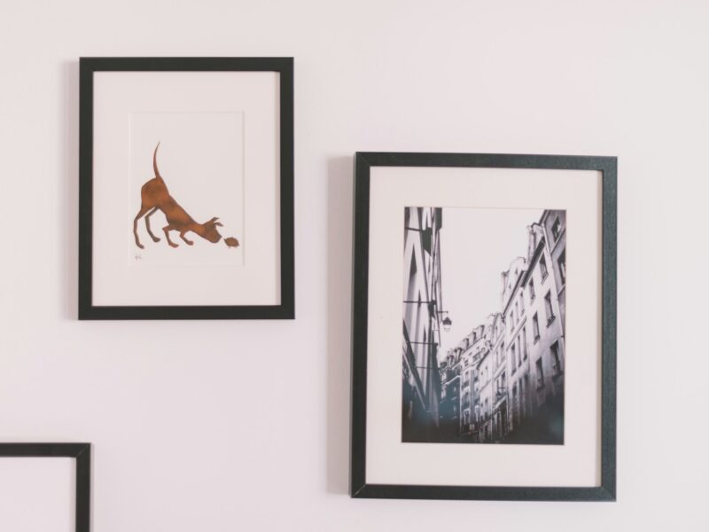 two assorted wall decors