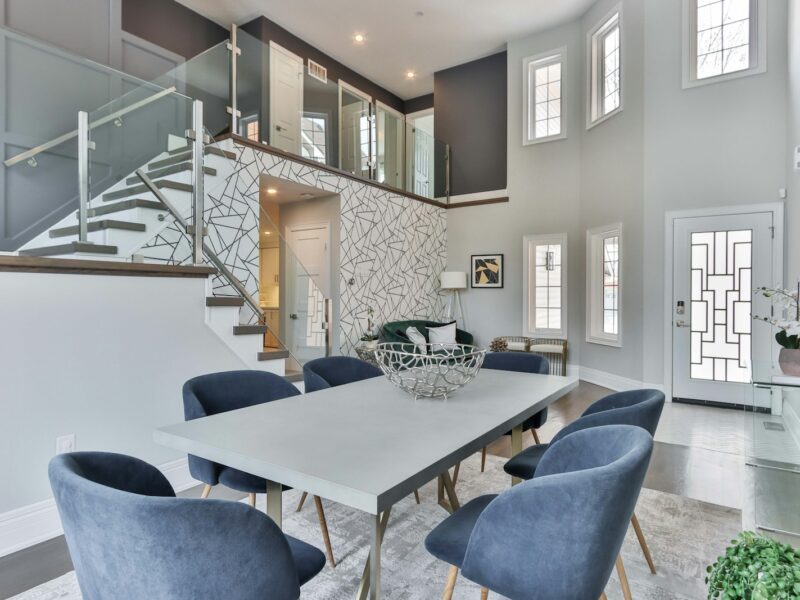 white and black wooden table with chairs