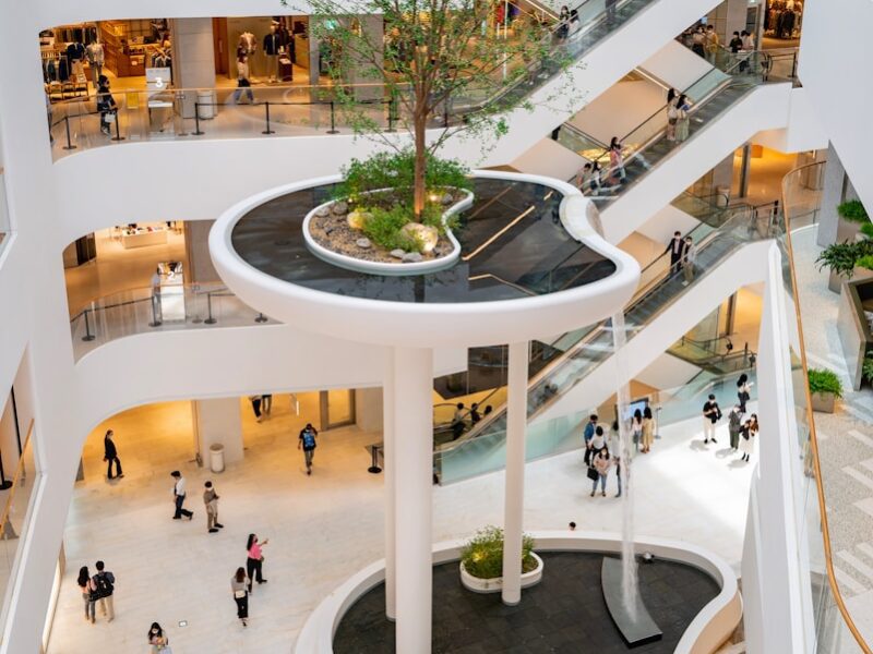 people walking inside white building