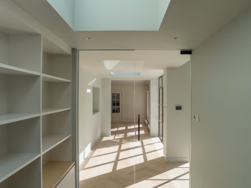 white wooden shelf near white wall