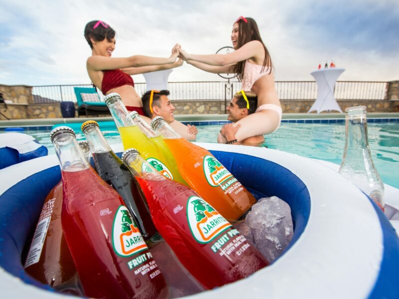 woman in yellow bikini sitting on swimming pool