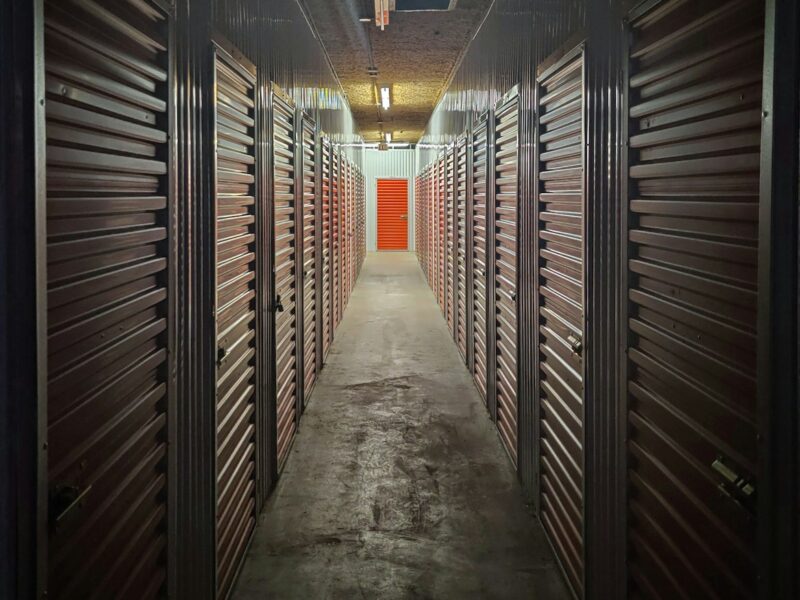 empty hallway with lights turned on in the middle