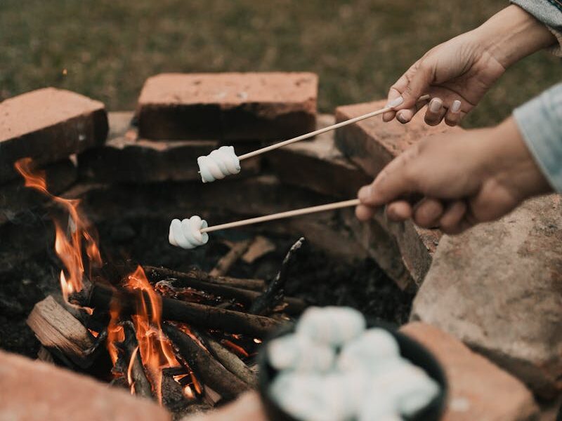 Marshmallows roasting over a smokeless fire pit