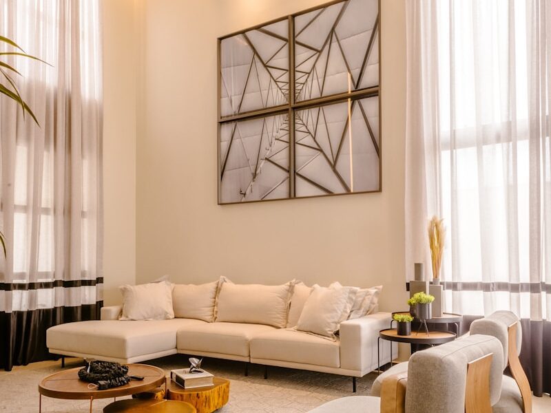 a living room with a couch a chair and a table