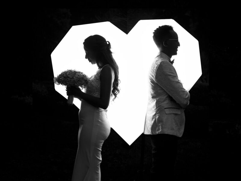 a man and woman holding hands
