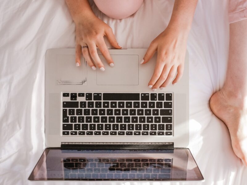 woman using MacBook Pro
