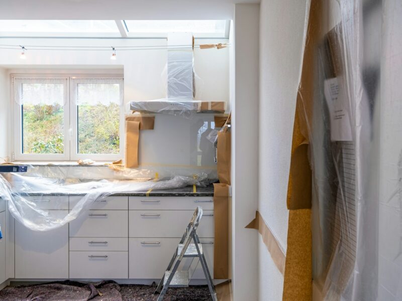 white wooden cabinet near window