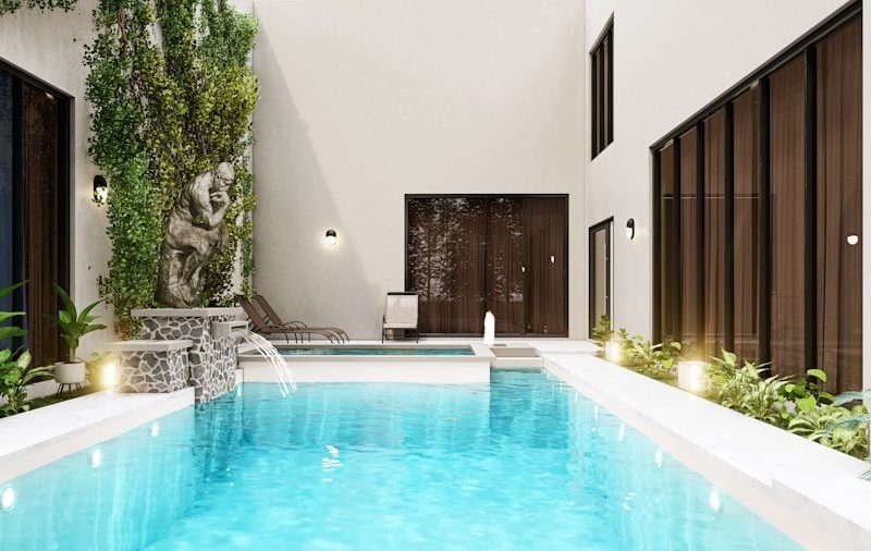 swimming pool near green trees during daytime