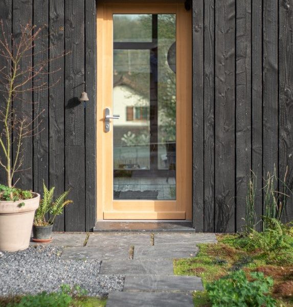 brown wooden framed glass window