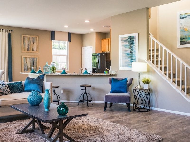 black wooden table on rug